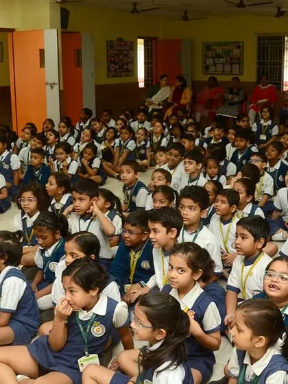 A hall full of captivated students at Mahadevi Birla World Academy. My goal is to hold their attention with every twist and turn of the tale.