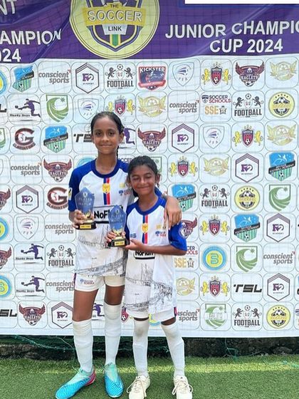 Two of our players proudly display their trophies at The Soccer Link Junior Champion Cup. These pre-season tournaments are excellent for skill development and building confidence.