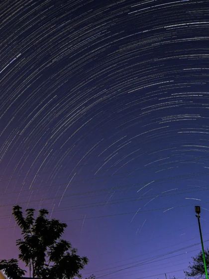 The magic of star trails captured around the North Star, Polaris, during one of our camps. This long exposure photograph shows the Earth's rotation against a backdrop of countless stars.