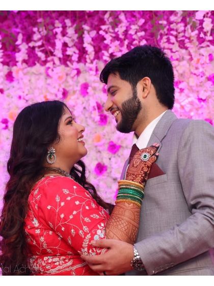 Love is dark. Love is mehendi. A sweet, candid moment between my bride Ruchi and her partner during their engagement.