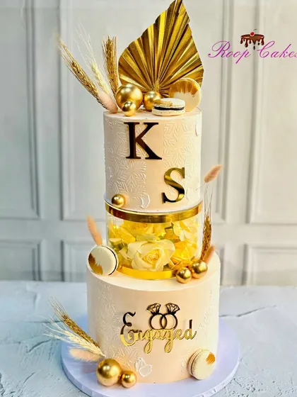 Make your engagement sweeter with a custom cake. This 4kg chocolate truffle cake is a version of my popular floral separator design, customized in beautiful shades of gold and ivory.