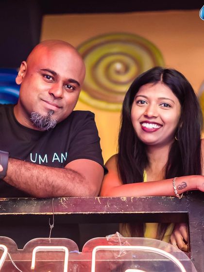 Posing with a guest by the DJ booth.