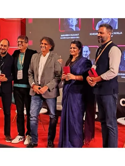 A moment of camaraderie on stage at FOAID 2024. Our founder stands with fellow panelists, celebrating the shared passion for design and mentorship that brought them together for the event.