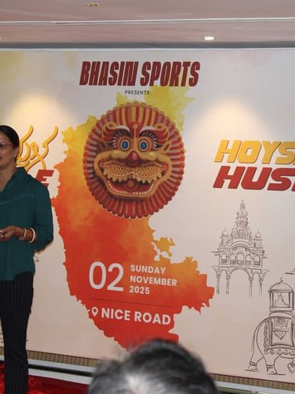 A community leader sharing her excitement at our Hoysala Hustle launch event. The energy and support from local runners is what fuels our passion for organizing these events.