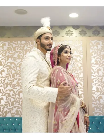 A classic wedding portrait of a couple, capturing their grace and poise.