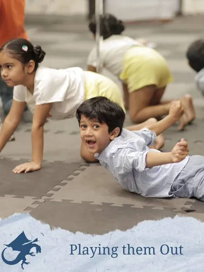 After discussing feelings and stories, we get physical. Here, children are playing out the story, embodying characters and actions with energy.