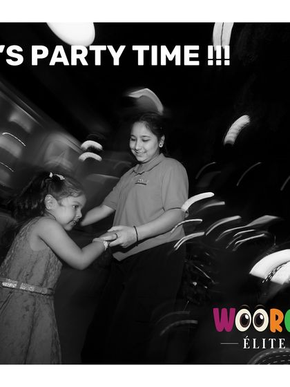 It's party time. One of our friendly staff members dances with a little guest, showcasing our commitment to creating a joyful and interactive experience for everyone.