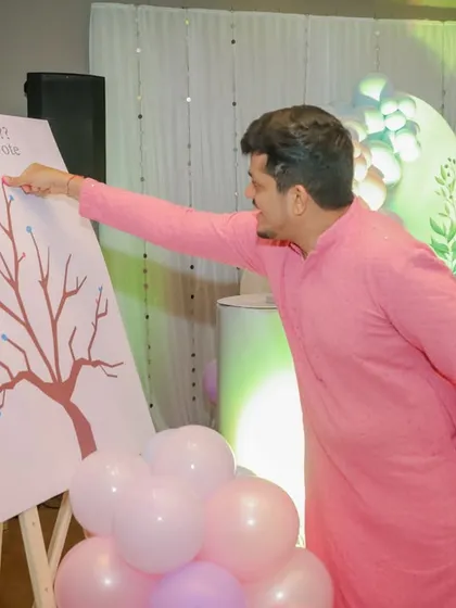 The big reveal! This "Boy or Girl?" voting tree is a fun and visual way for guests to cast their vote before the gender is announced. It builds anticipation and makes for a great photo opportunity.