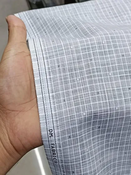 This is a high-quality kurta fabric with a grey checkered pattern. It is a comfortable and breathable material, perfect for everyday wear.