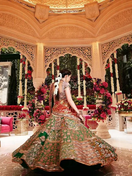 The full, twirling skirt of this Anamika Khanna lehenga shows off its incredible volume and detail. It’s a truly cinematic piece for a grand entrance.