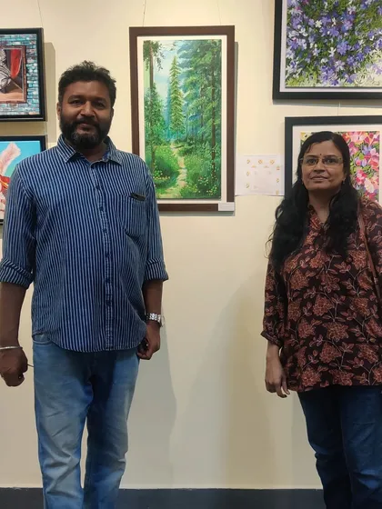 With a fellow artist at the gallery. It's always great to connect with other creative people.