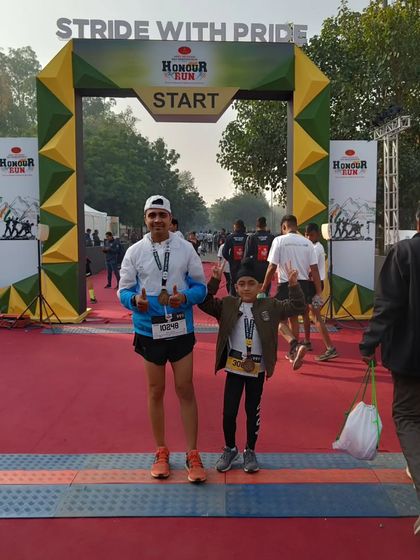 Thumbs up at the finish line. This young champion completed the Honour Run, and I couldn't be prouder.