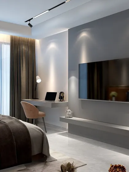 This boy's bedroom in Rajouri Garden features a balanced modern style that is both enticing and attractive. The minimalist decor and integrated desk create a space for calm, study, and leisure.