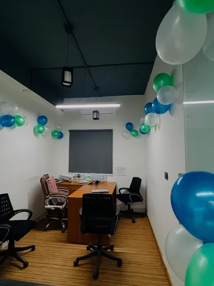 Simple balloon decorations for a corporate event or office party. Even a small touch of decor can make the workspace feel more festive.