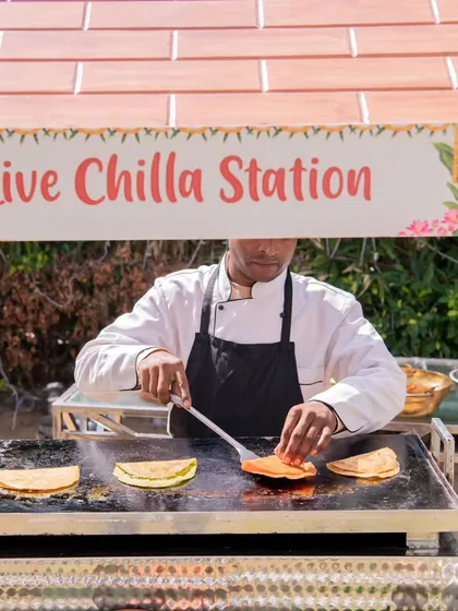Experience the excitement of food cooked fresh for your guests with my interactive live chilla station. My chef prepares savory Indian crepes on the spot, providing both a delicious meal and an engaging culinary show.