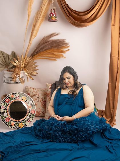 A meditative pose in our new lifestyle setup. The intricate mirror and hanging bell add a unique, artistic touch to the cozy and relaxed boho vibe.