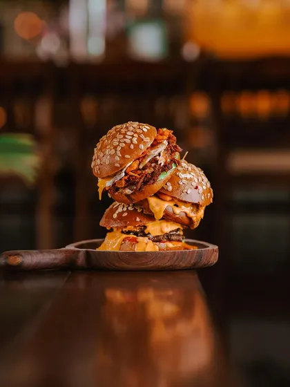 A winning trio of our all-American style burgers: hickory-smoked pulled pork, savory smashed lamb, and the classic smashed beef.