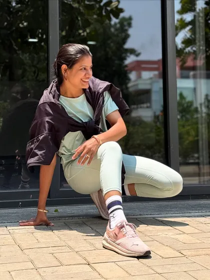 Finding strength and flexibility is a core part of my personal practice. Here, I’m connecting with my body and the space around me, a feeling I guide my students to discover in every class.