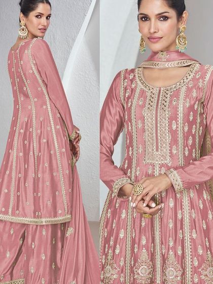 I love this onion pink Chinon silk palazzo suit for its soft, feminine vibe. The heavy thread and sequin work on the top makes it a standout piece for any festive occasion.