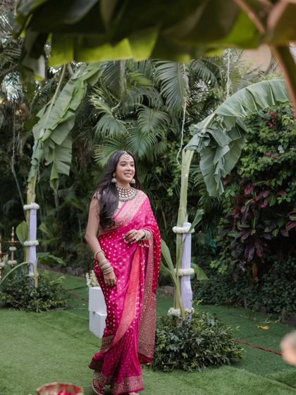 The bride walks towards the groom for their 'first look', her happiness evident in every step.