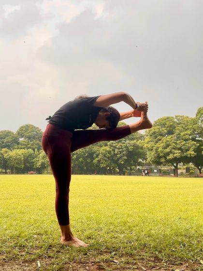 A variation of Dandayamana Janu Sirsasana, or Standing Head-to-Knee Pose. This posture is a prayer in motion, stretching the ego as much as the body and cultivating deep awareness.
