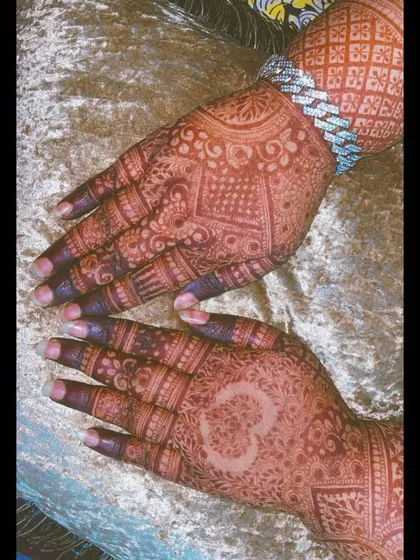 A different personalized design, featuring the Om symbol, which holds spiritual significance.