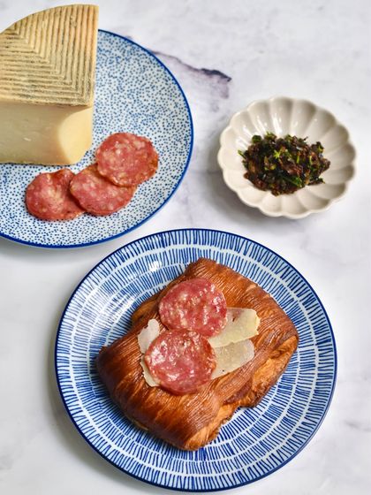 Our Ibérico Sausage & Cheese Pain Suisse. This savory viennoiserie combines premium Spanish sausage and cheese for a rich and satisfying bite.