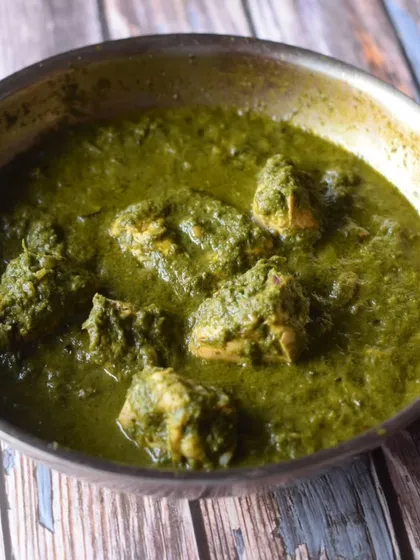 My version of Saag wala Chicken. I combined seasonal mustard leaves with green chillies, garam masala, and chicken. It's not traditional, but it's a wonderfully delicious winter dish.