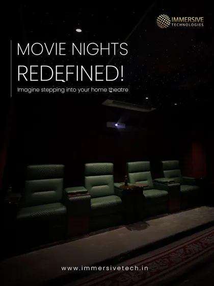 A view from the side of a custom home theater, showing the comfortable leather recliners and the subtle glow of the starlight ceiling. This is how we redefine the concept of a movie night at home.