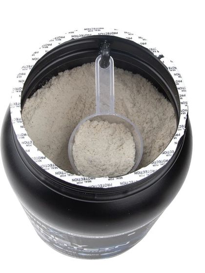 A top-down view of the Cookies & Cream whey protein powder.