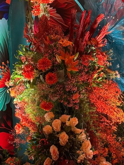 A closer look at the floral arrangement for the Bhaat ceremony. The mix of textures and warm colors creates a masterpiece of warmth, creativity, and happiness.