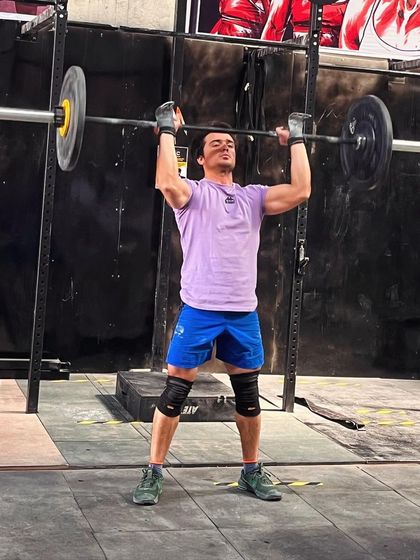 Finding energy and balance during the CrossFit Open. This push press is a fundamental movement for developing overhead strength, which is crucial for both the snatch and the jerk.