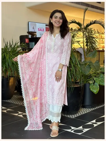 A soft, floral pink kurta set that is perfect for everyday elegance. The lightweight dupatta completes the look without adding any bulk.