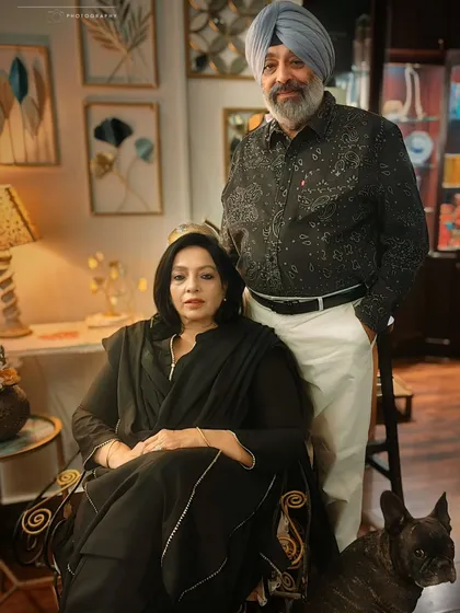 It's a special privilege to photograph parents and grandparents. This portrait captures a lifetime of togetherness, a quiet elegance, and the comfort of home, complete with their furry family member.