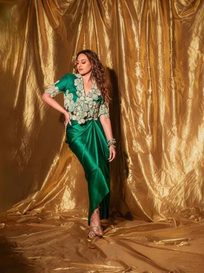 For the 'Heeramandi' promotions, we styled Sonakshi Sinha in this regal green draped ensemble by Anamika Khanna. The look, complete with intricate embroidery and traditional jewelry, was designed to reflect the grandeur of the series.