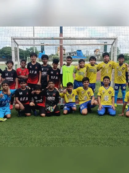 Our U11 team with their opponents from D'Souza Football Academy after a competitive friendly.