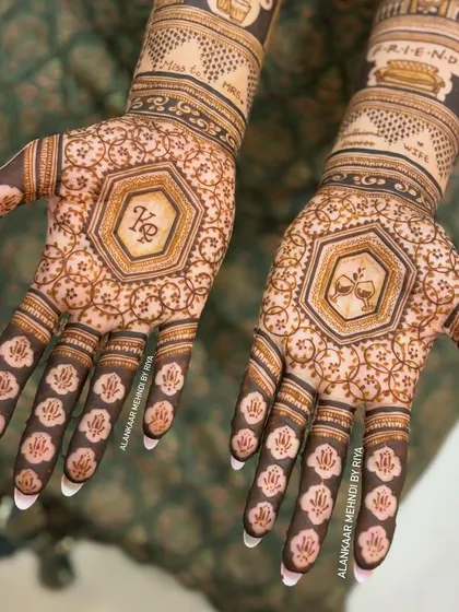 For the bride who loves unique simplicity, this design features the couple's initials (KG) in a geometric frame on one palm and a symbol of their story on the other.