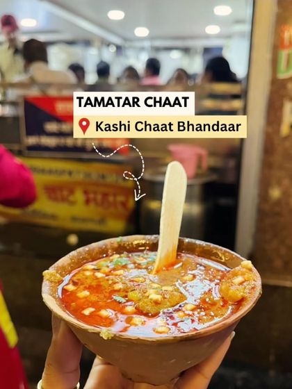 Trying the famous Tamatar Chaat at Kashi Chaat Bhandar. My travel content is always packed with local recommendations.