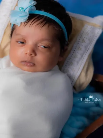 That expression is just priceless. Even at 20 days old, babies have so many little quirks and faces that I love to capture.