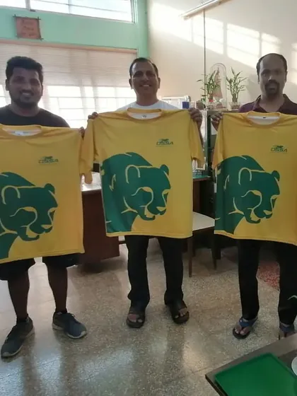 Our coaches proudly displaying the new team jerseys, representing the identity and spirit of the DSSA family.