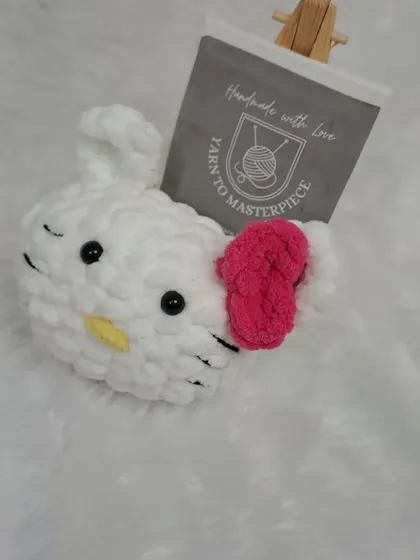 Look at this adorable finished Miss-Kitty plushie, made with love and soft, chunky yarn. This is the exact toy you can create using my beginner-friendly DIY kit. It's the perfect handmade gift or a cute friend to keep for yourself.