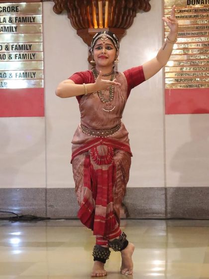 A dynamic pose from my Ganesh Chaturthi performance. This particular movement depicts the grand and majestic walk of the elephant-headed god, a favorite story to portray through dance.