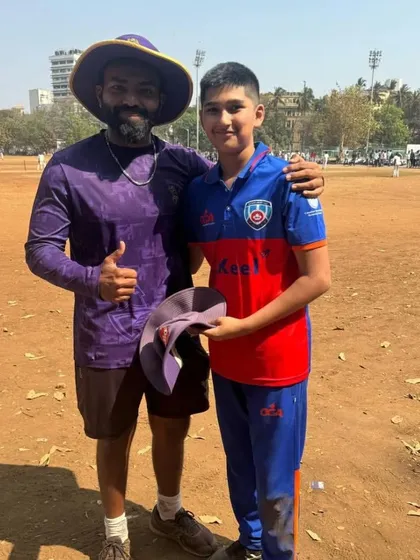 Our coach with a young player from the visiting Ontario Cricket team.