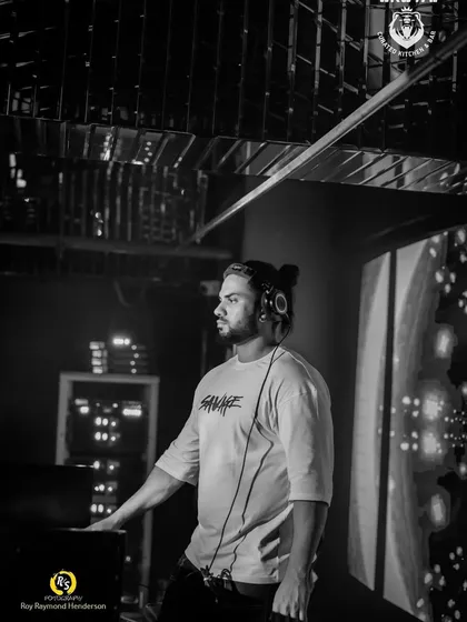 A black and white shot that captures the intensity and focus required to be a DJ. It's just me, the music, and the crowd.
