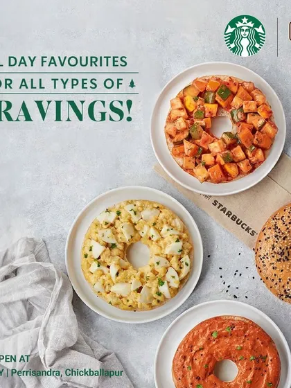 An advertisement from Starbucks showcasing their all-day bagel menu, offering a variety of savory options for any craving, at any time.