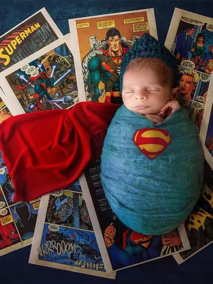 Even superheroes start small! I love bringing your creative ideas to life, like this custom Superman-themed shoot. It’s all about capturing your little one's big personality from day one.