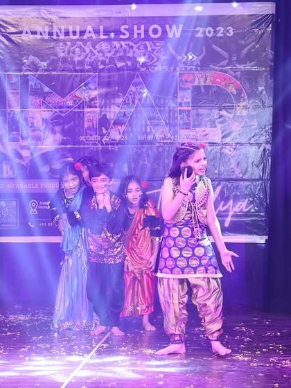 This scene from our folk performance uses expressive acting and choreography to tell a story, drawing the audience into the narrative.