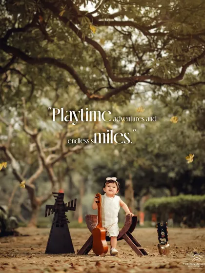 Playtime adventures and endless smiles. A sweet toddler stands with her ukulele in a rustic outdoor setting, ready to make some music.