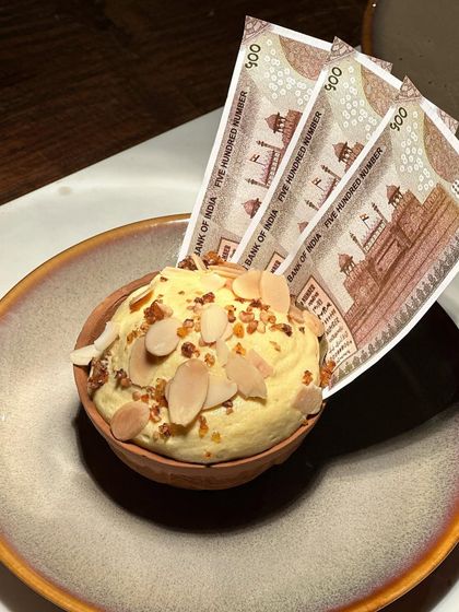 Our signature kulfi dessert, a sweet and rich ending to a perfect meal.