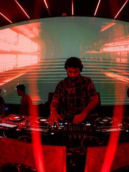 Another shot from a massive night at Soho. The red lights and huge screen create an immersive experience for everyone in the room.